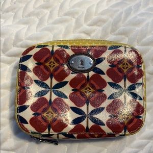 Fossil floral key-per jewelry case.